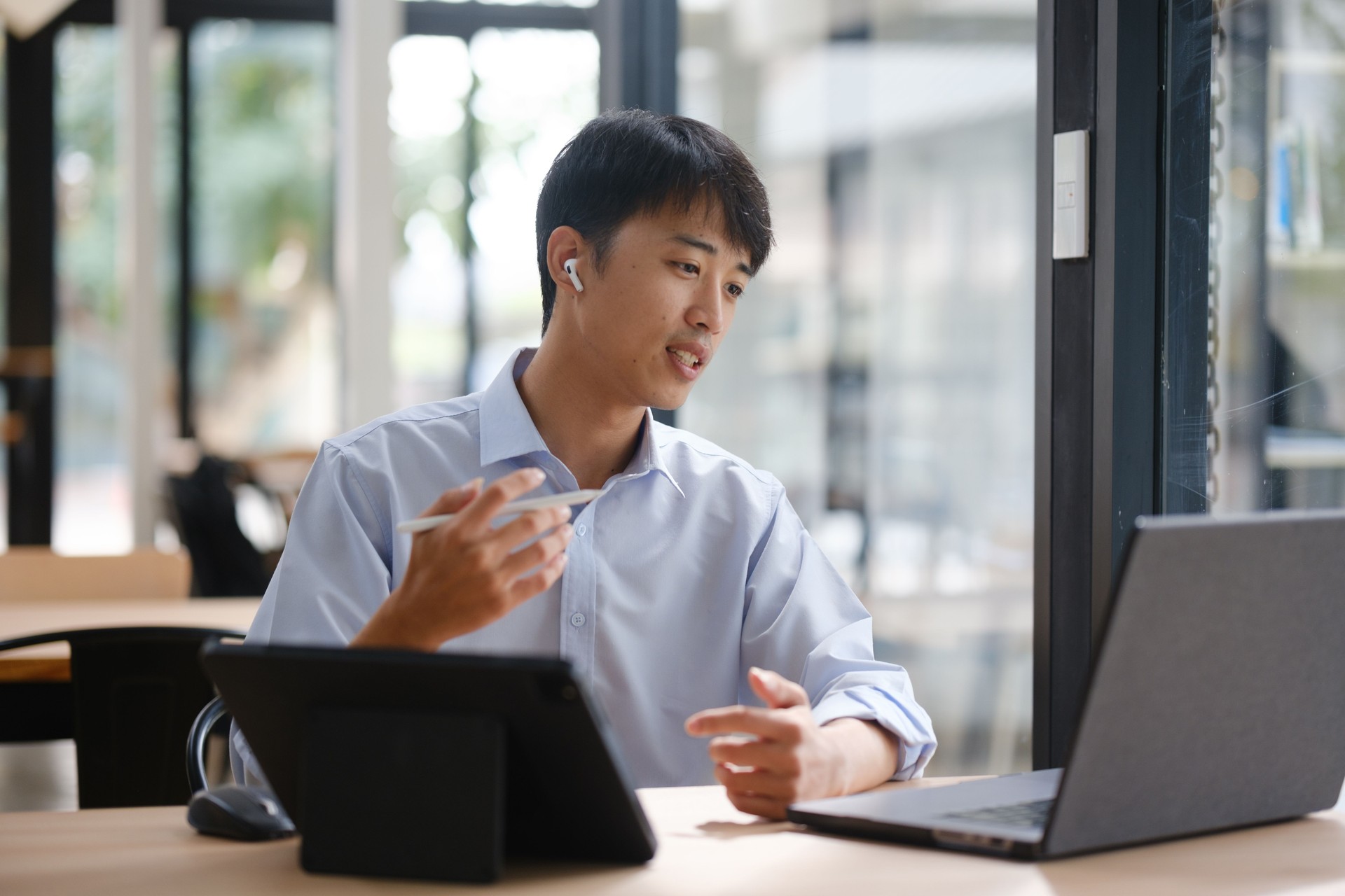 Business consultant advising clients and team in a video conference