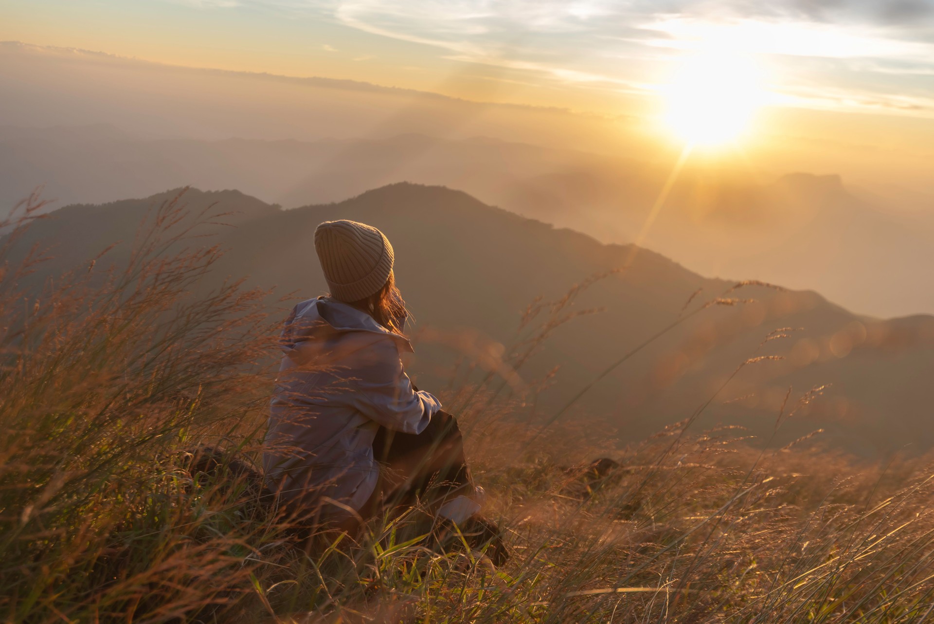 Lifestyle traveler happy feeling good relax and freedom facing in the sunrise morning. Travel Concept
